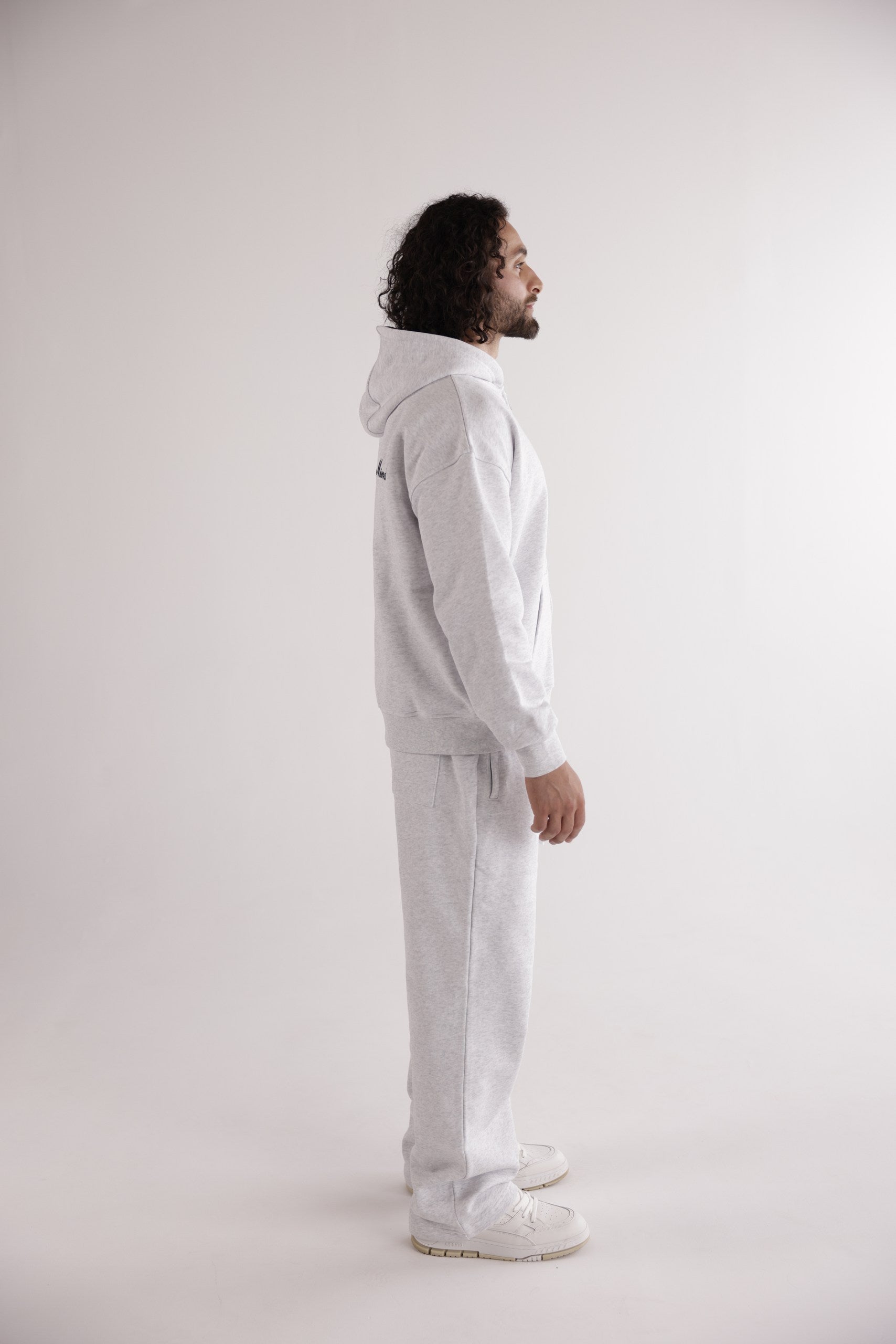 HERREN JOGGINGHOSE „EMBLEM“ MIT GERADEM BEIN – GRAU MELIERT