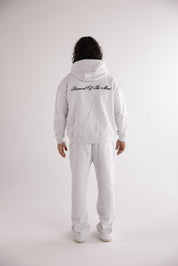 HERREN JOGGINGHOSE „EMBLEM“ MIT GERADEM BEIN – GRAU MELIERT