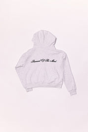 Light gray hoodie with text on the back against a white background