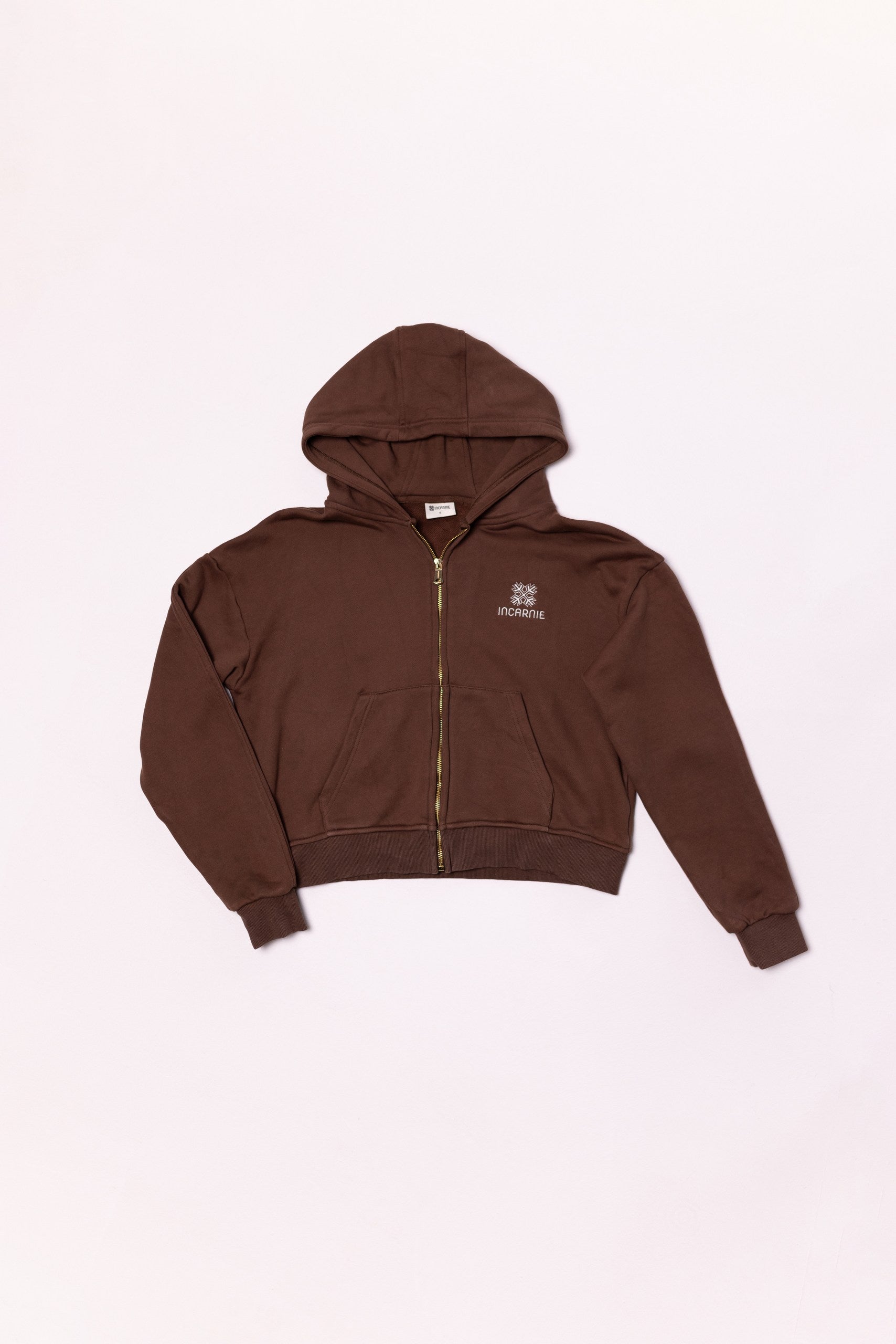 Brown hoodie with a brand logo on a light background