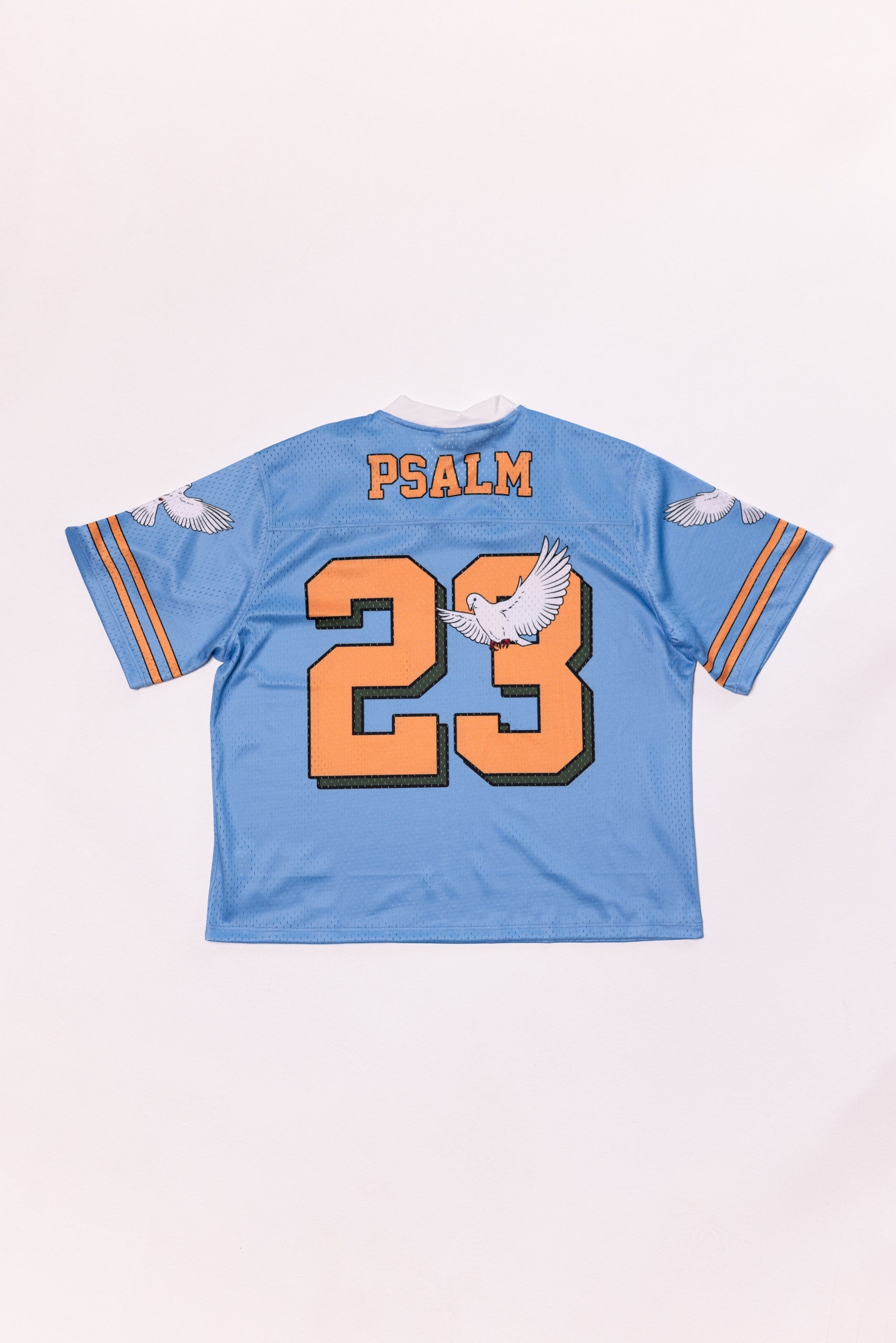 Blue sports jersey with 'Psalm 23' printed on a white background