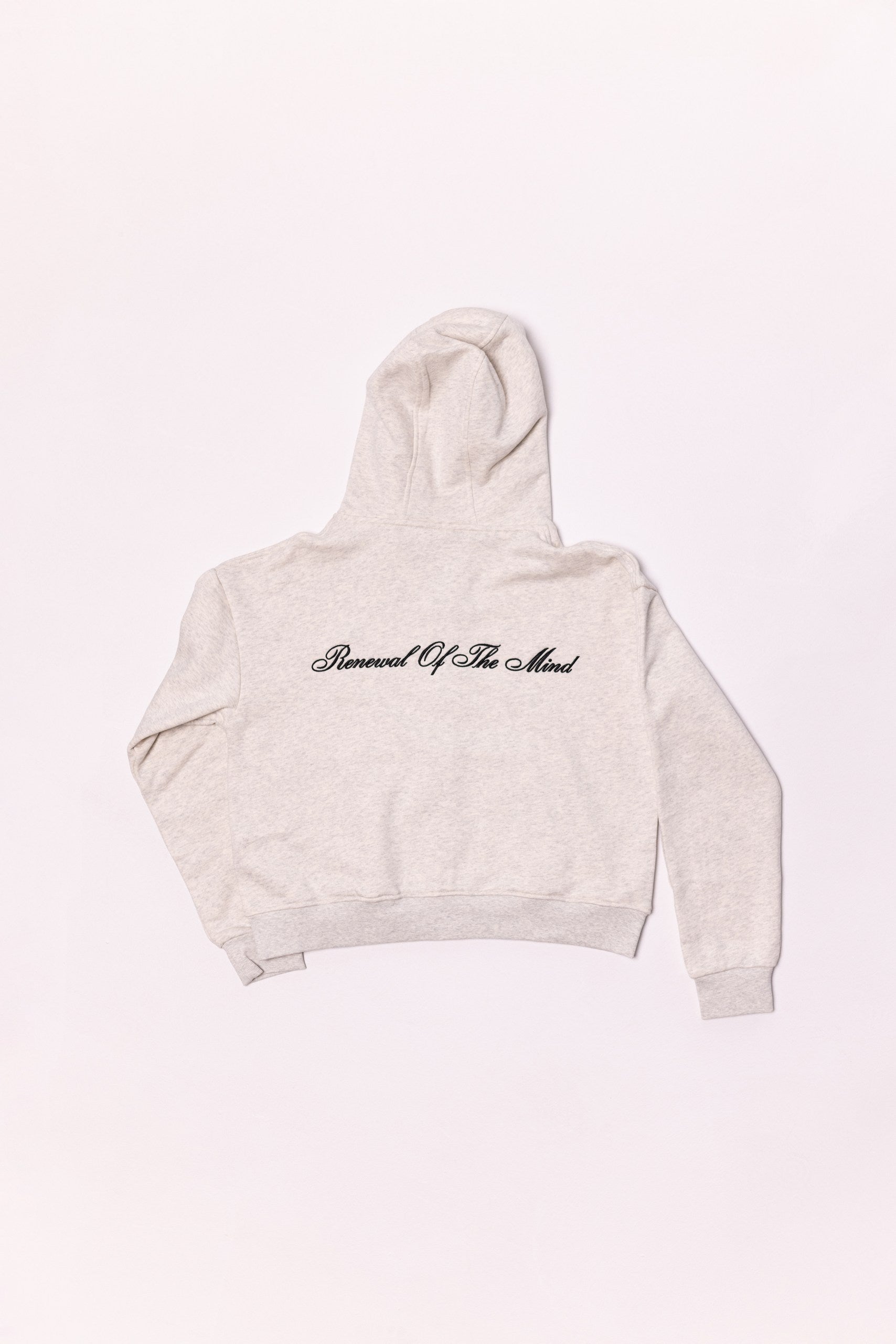 Beige hoodie with text on a light background