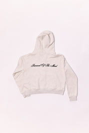 Beige hoodie with text on a light background