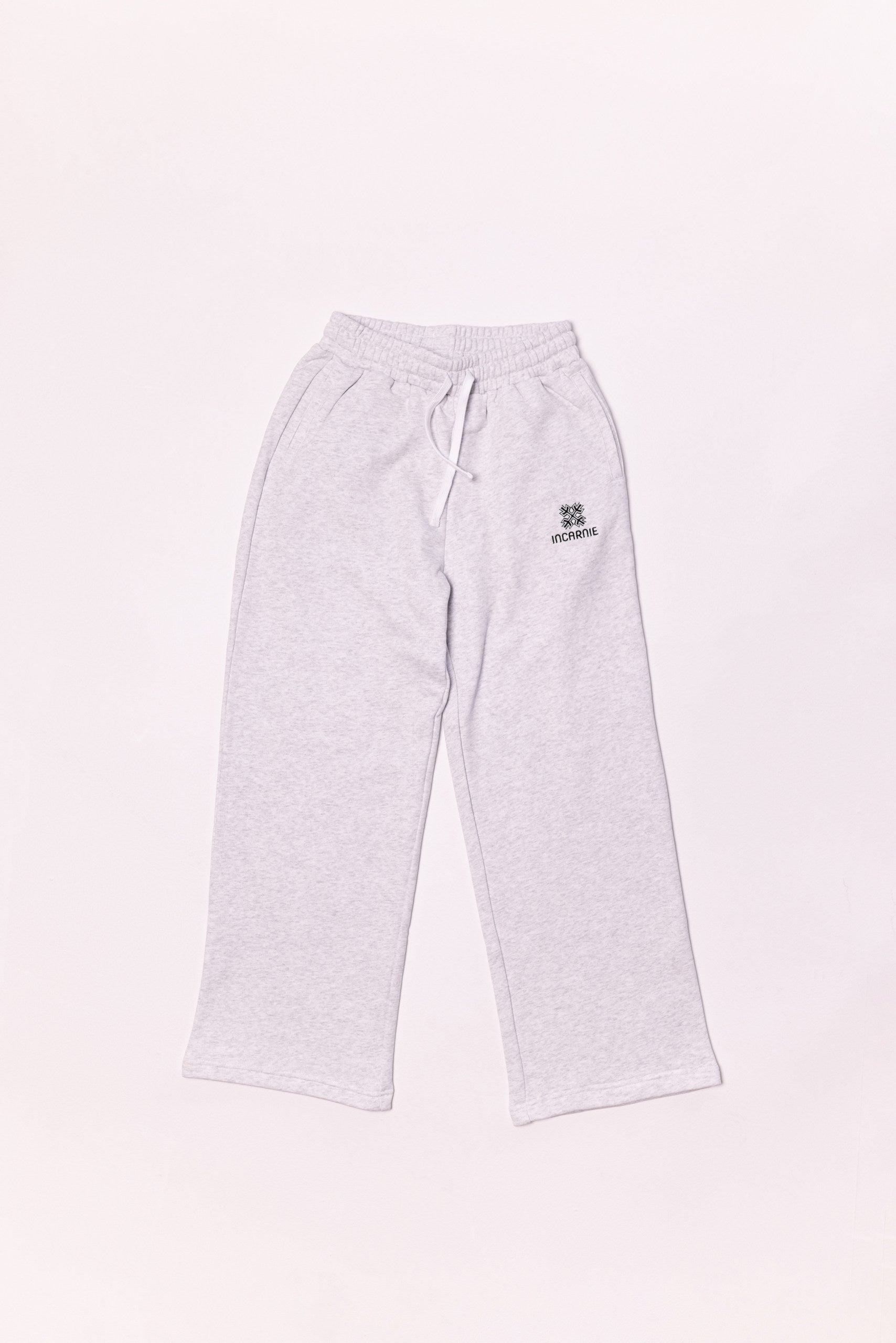 Light gray sweatpants on a white background with logo