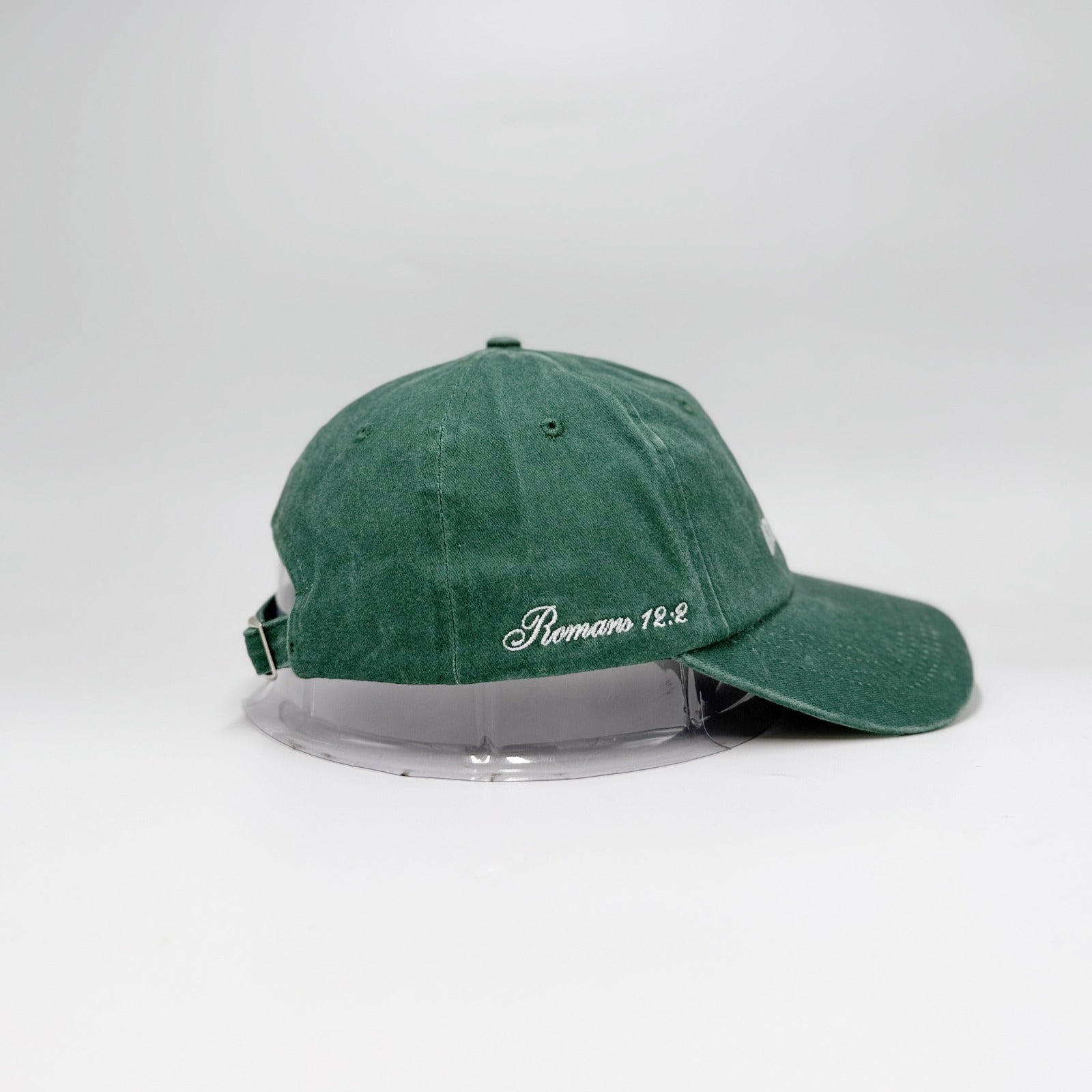 Green cap with text on a white background