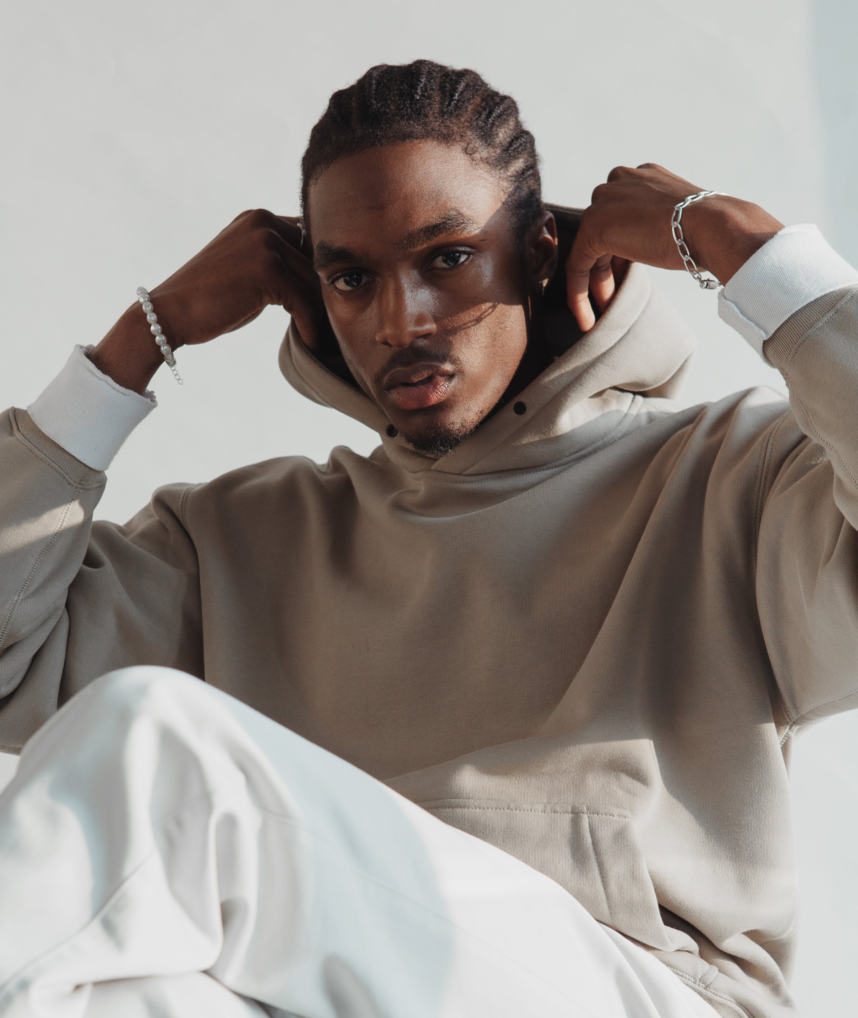 man-in-white-and-light-tan-outfit.jpg